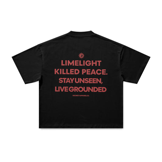 Black t-shirt with red text on the back on a white background